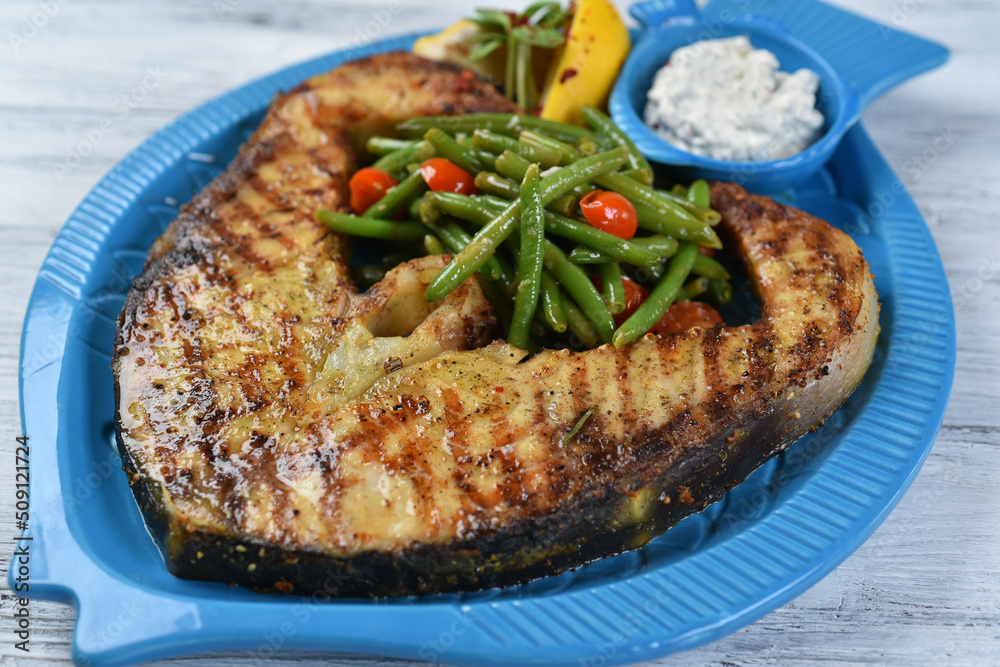 fish steak with asparagus, salmon steak with vegetables, tomatoes, asparagus fish steak with asparagus, salmon steak with vegetables, tomatoes, asparagus