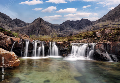 Mountain landscape with waterfall In Isle of Skye, Scotland - Fairy pools