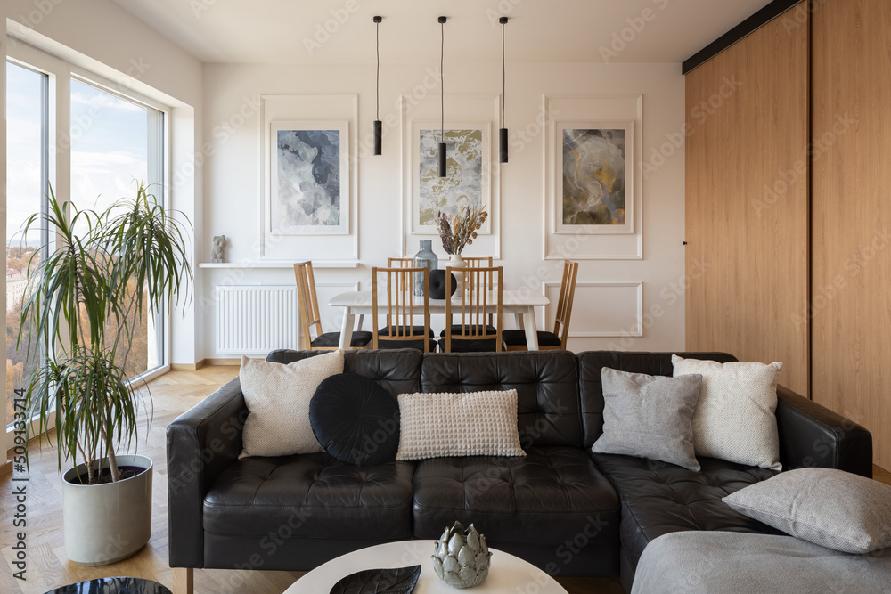 Fototapeta premium Modern living room with dining table