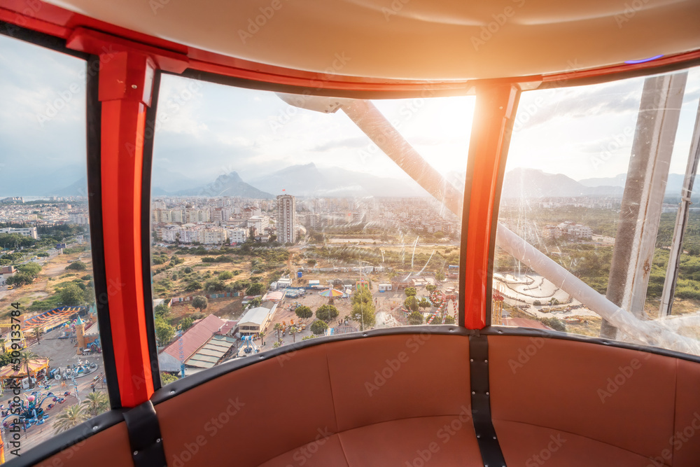 Fototapeta premium Interior of a cabin of ferris wheel in amusement luna park. Entertainment and fair concept. Inside of empty gondola