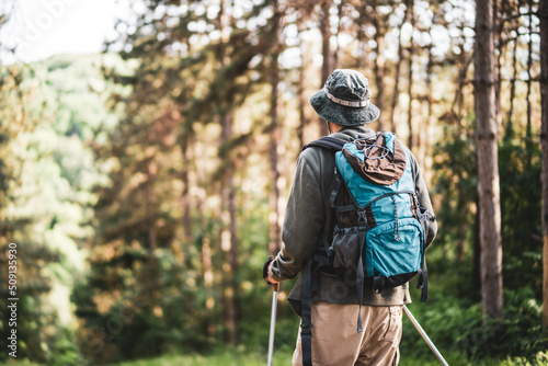 Image of man enjoys hiking in nature.