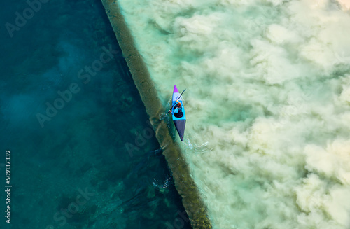 Fényképezés Geneva, Switzerland - June 3, 2022: The kayaker paddles over La Jonction - the j