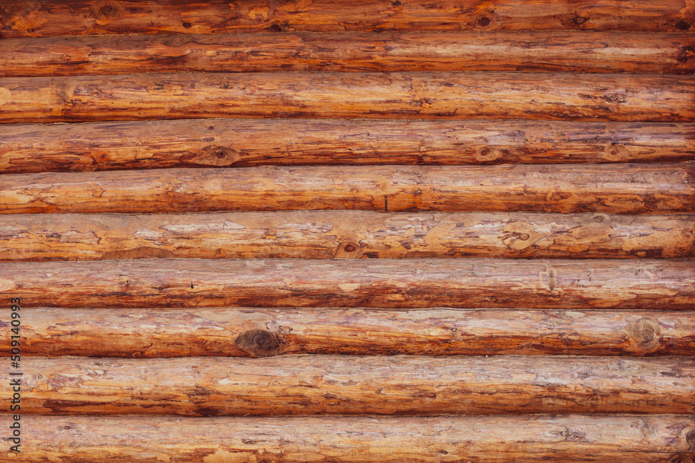 wall made of round logs without bark wall made of round logs without bark