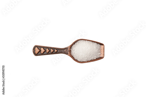Natural Sweetener or sugar substitute in metal scoop isolated on white background. Granular low-calorie sugar substitute