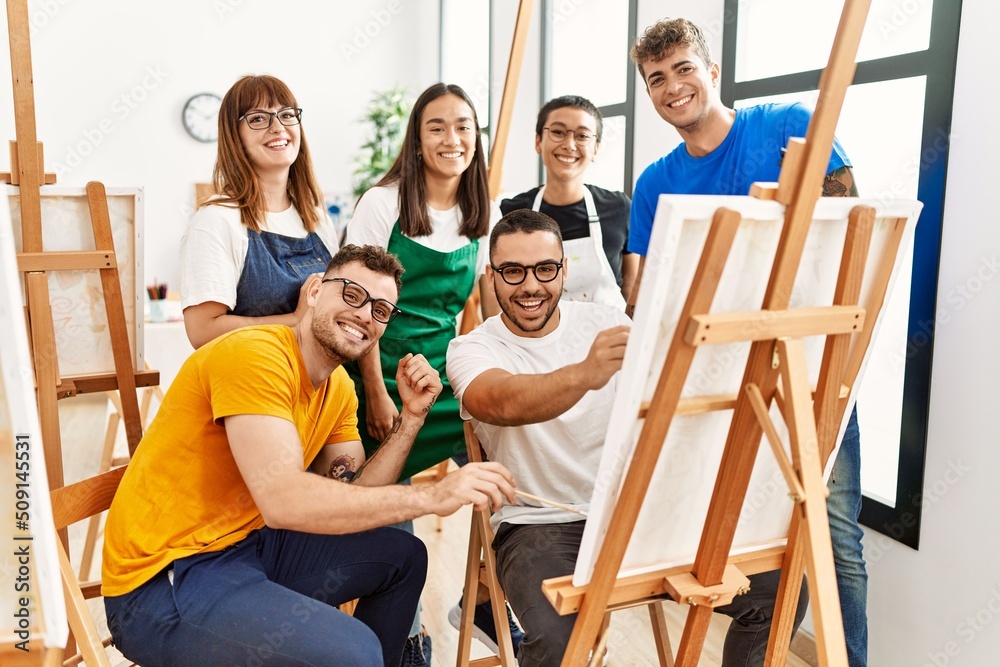 Group of people smiling happy and looking draw of partner at art studio. Group of people smiling happy and looking draw of partner at art studio.