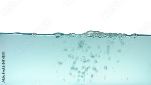 Water waves and splash with bubbles of air isolated on white background 