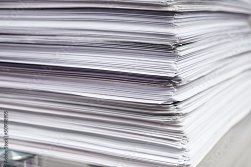 A stack of white office papers