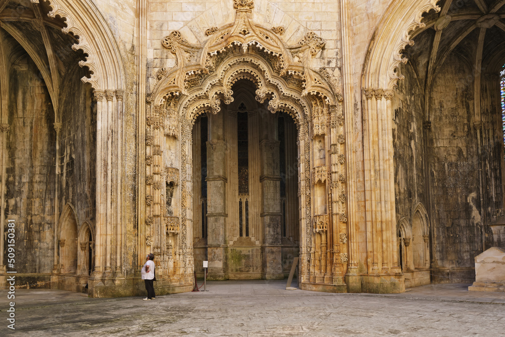 carved arches, pillard and vaults in Interior of the Unfinished chapels in Batalha monastery, Portugal