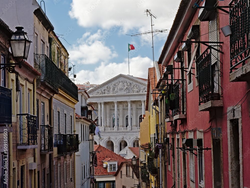 Asemblea de republica building in neoclassical style, framed by old typical Portuguese houses, lisbon