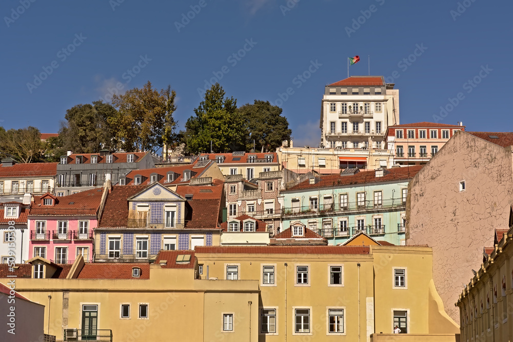 Pastel colored houses and apartment buildings on a hill of Lisbon Pastel colored houses and apartment buildings on a hill of Lisbon