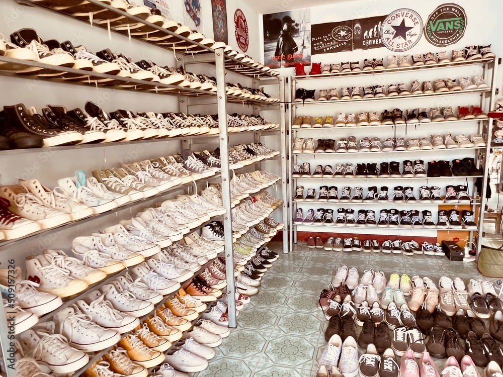 Van vintage old school and converse brand shop on shelves, Shoes second hand  , 6 June 2022 , Buriram province. Stock Photo | Adobe Stock