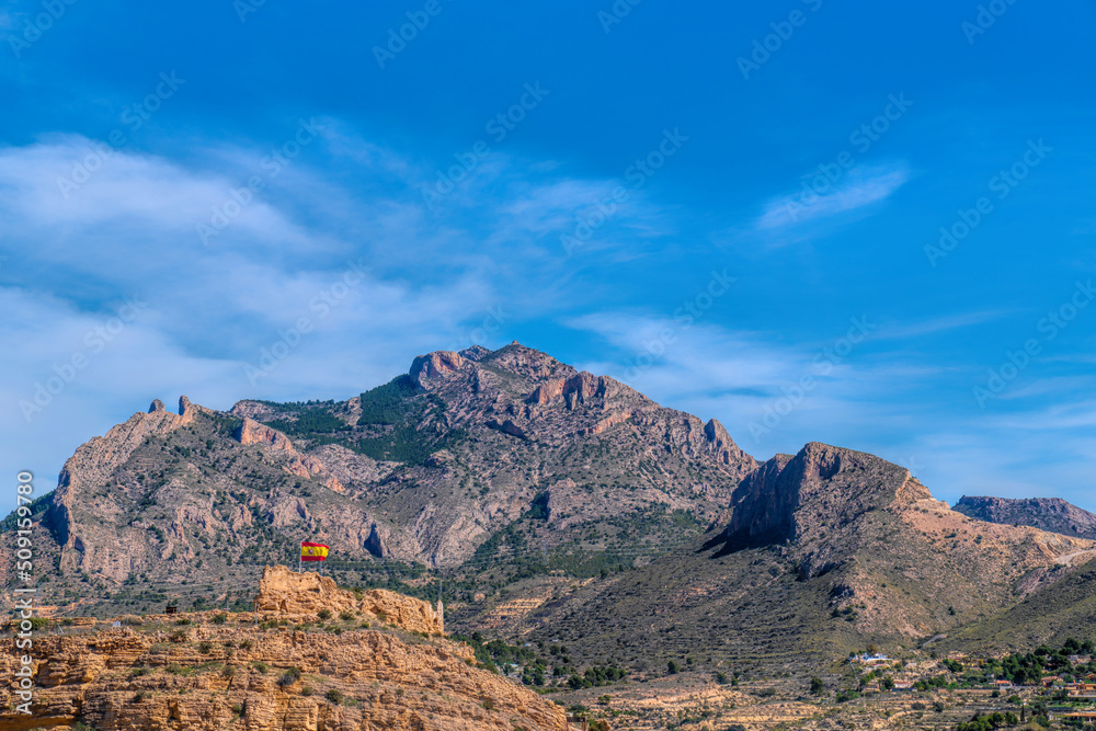 Busot Castle Spain with mountains in historic village tourist attraction near El Campello and Alicante