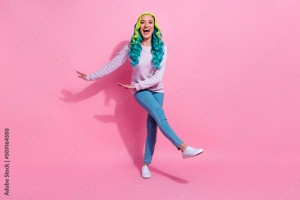 Full body image of good mood laughing female have fun dancing nightclub weekend isolated on pink color background Full body image of good mood laughing female have fun dancing nightclub weekend isolated on pink color background