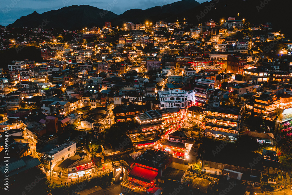 aerial view of night scene of Jioufen village, Taiwan. The colourful scene at night of Jiufen old city, Jiufen, Taiwan.