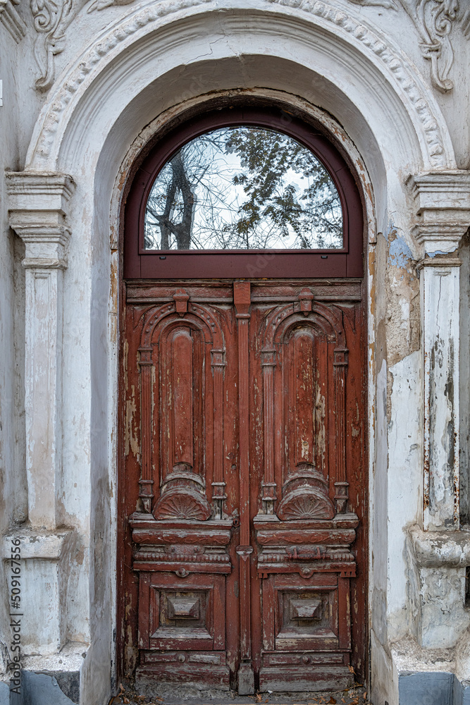 Old doors in the entrance of an old house. Old doors in the entrance of an old house.