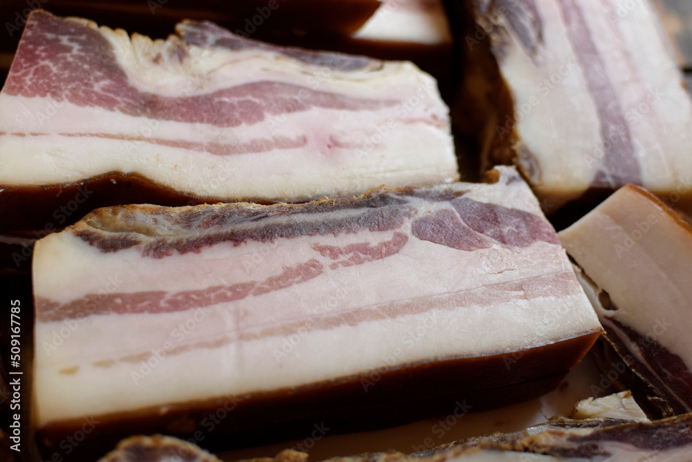 Serbian smoked bacon. Smoked pork meat. Natural product from organic farm, produced by traditional methods