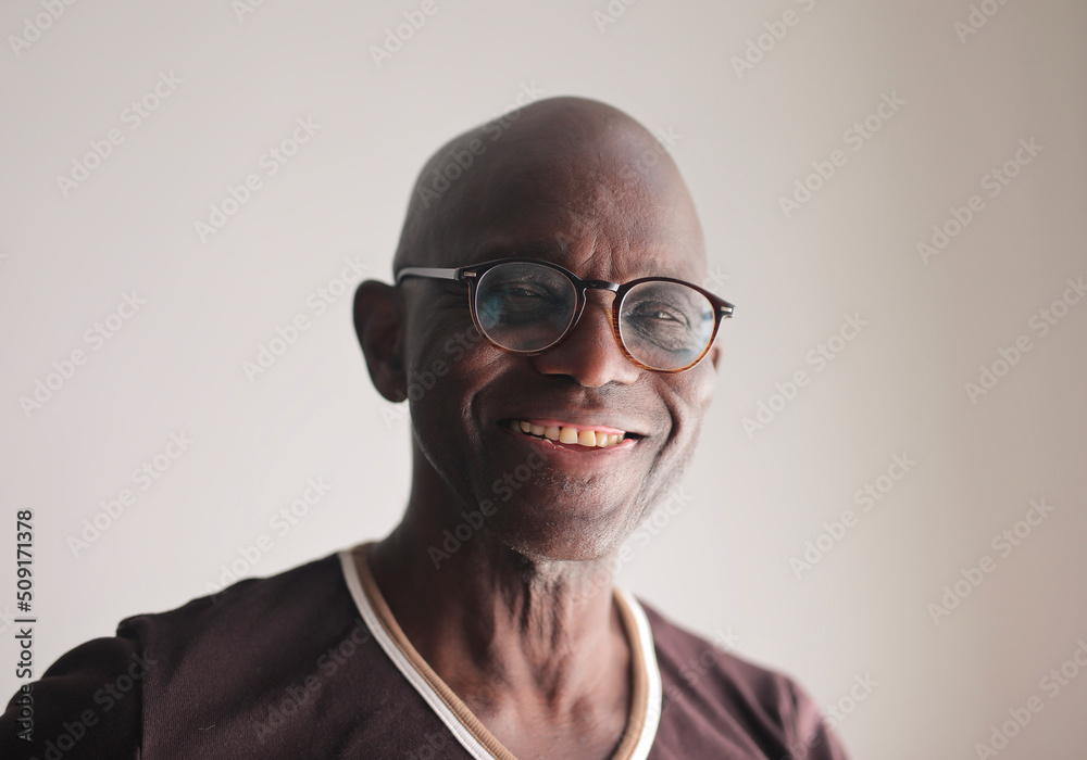 portrait of a smiling black man portrait of a smiling black man