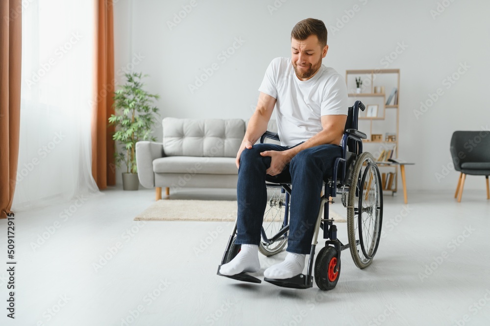 Capable disabled trying to get up from the wheelchair. Capable disabled trying to get up from the wheelchair.