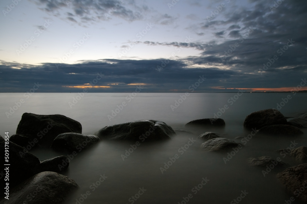 Rocks in water at night nature landscape Rocks in water at night nature landscape