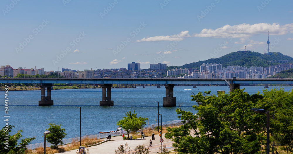 view of the han river, the namsan tower and the bridge