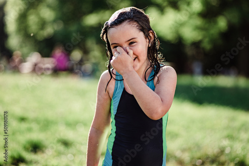 Wallpaper Mural Wet girl smiling in park Torontodigital.ca