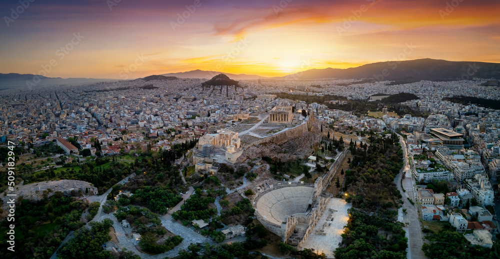Panoramic sunrise view of the cityscape of Athens, Greece, with Acropolis, Parthenon Temple, old town Plaka and Lycabettus Hill