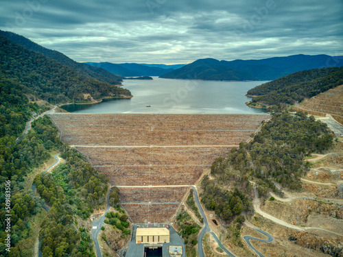 Aerial view of the Dartmouth Dam wall, Victoria, Australia. November 2021. It is the largest capacity storage in the River Murray system and was 85% full at this time.