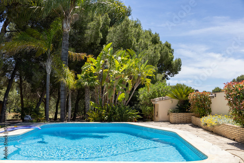 Mediterranean holiday destination with blue swimming pool © Julia