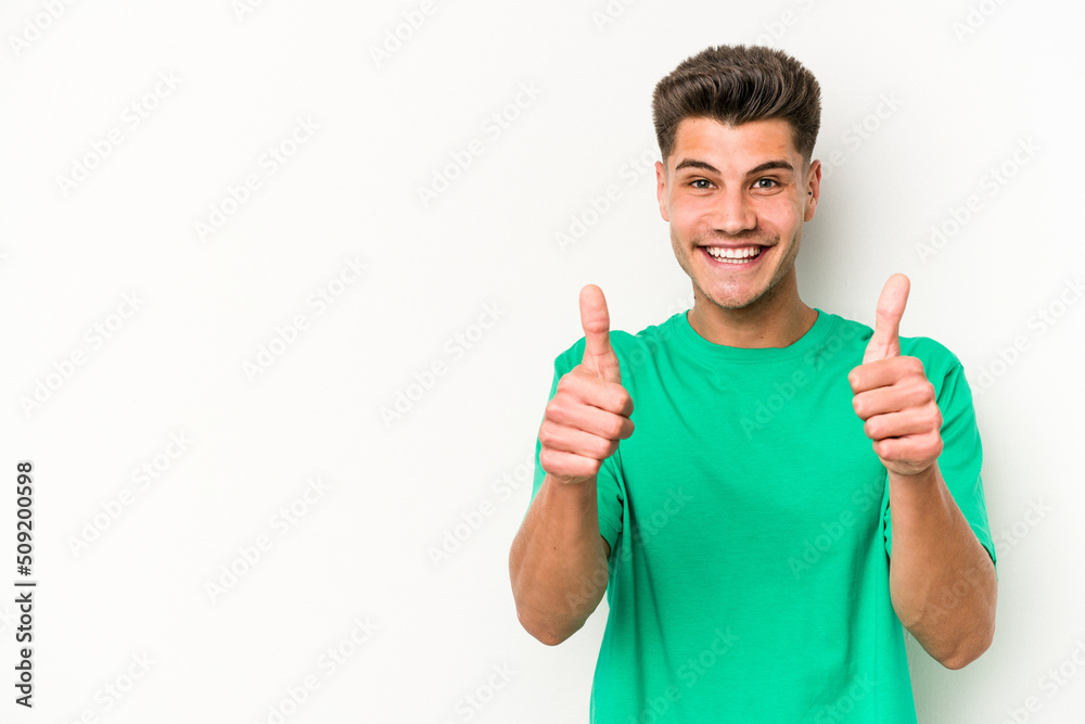 Young caucasian man isolated on white background smiling and raising thumb up Young caucasian man isolated on white background smiling and raising thumb up