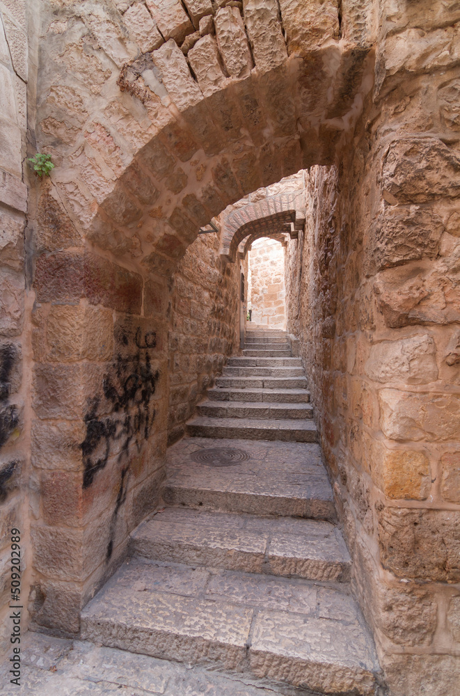 Jerusalem Old City street with steps and arches