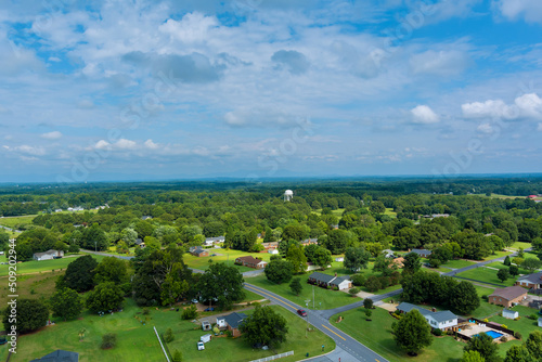 Fototapeta Naklejka Na Ścianę i Meble -  Aerial panoramic view of a Inman small town city near of forest in South Carolina USA