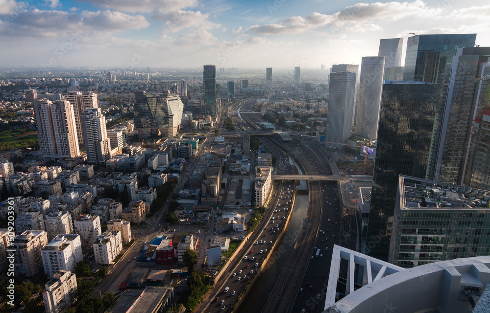 Tel Aviv city aerial view above: Ayalon river and modern skyscrapers