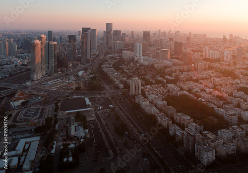 Tel Aviv sunset view from above. Aerial panorama. Tall modern buildings