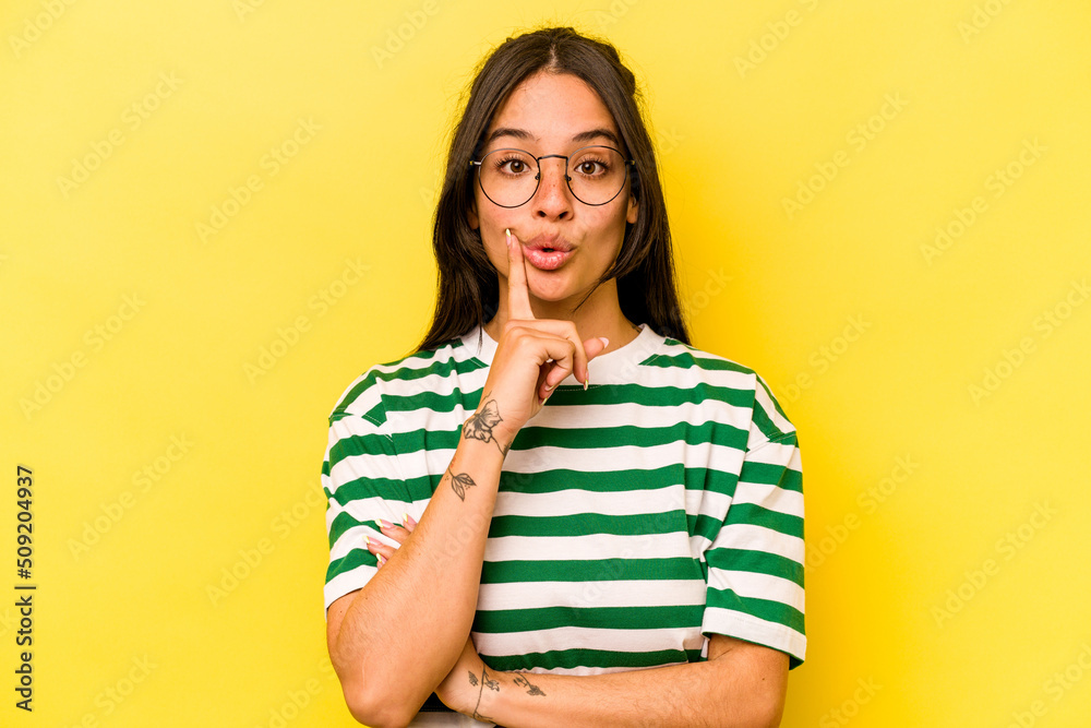 Young hispanic woman isolated on yellow background having some great idea, concept of creativity. Young hispanic woman isolated on yellow background having some great idea, concept of creativity.