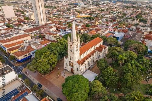 Sertaozinho, São Paulo / Brazil - Circa june 2022: Aerial image of the city of Sertaozinho, SP. Our Lady of Aparecida Parish Church