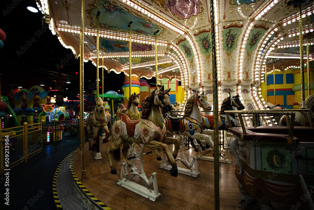 Photo children's carnival carousel with horses
