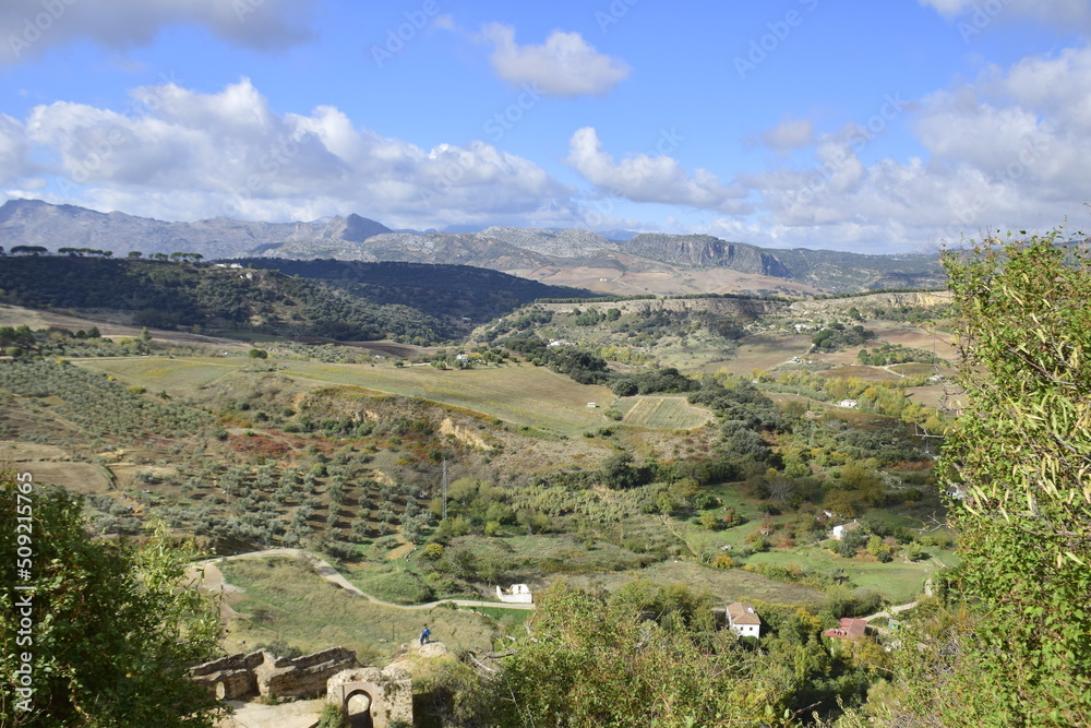 Ronda, Andalusia, Spain - 08 november 2019: View of the valley and the rocks at the foot of the town of Ronda