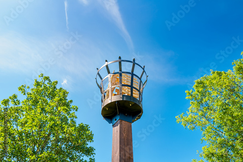 Newly installed park beacon seen with dry wooden pallets to be used as a Beacon fire for the Queen's Platinum Jubilee. The pallets had been filled in the basket by a cherry picker. photo