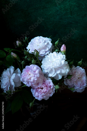 Bouquet of flowers on a dark green background