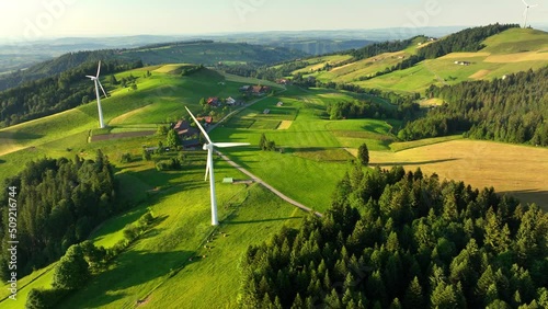 wind farm in idyllic countryside, renewable energy and sustainable development concept, wind turbines in green meadows, alternative energy, natural electricity  photo