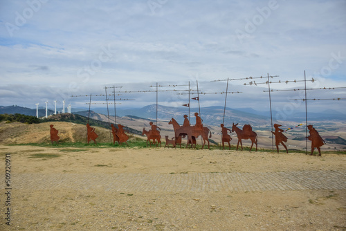 Pamplona  Spain - 6 October 2019  Iron sculpture of a group of pilgrims in the Alto del Perdon  the Mount of Forgiveness   near Pamplona  in the Camino de Santiago  The Way of Saint James .