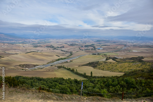 Pamplona, Spain - 6 October 2019: View of the surroundings of Pamplona from the Alto del Perdon (the Mount of Forgiveness), near Pamplona, in the Way of Saint James photo