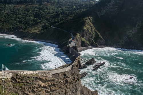 View of the bridge to San Juan de Gaztelugatxe island from above. Biscay Bay, Spain photo