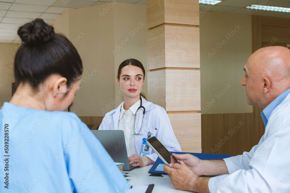 Obraz premium Team doctor, nurse and internship doctor talking and discussing about surgery treatment patient’s case while sitting in the meeting room office in hospital. healthcare and medical concept.