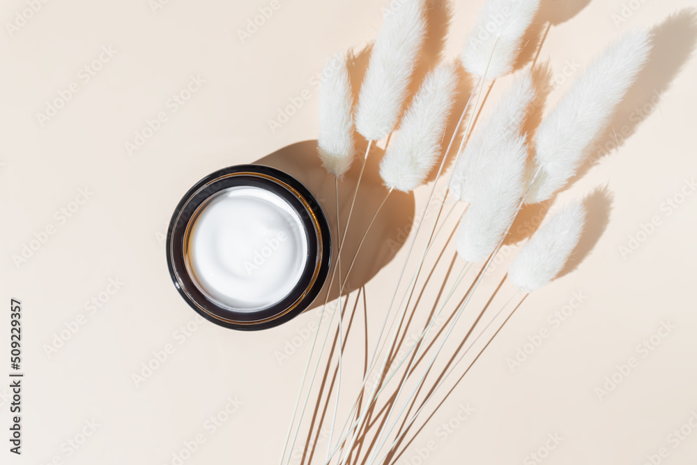 Fototapeta premium Face cream moisturizer in a jar, luxury skincare cosmetics and anti-aging product for healthy skin and beauty routine. Top view