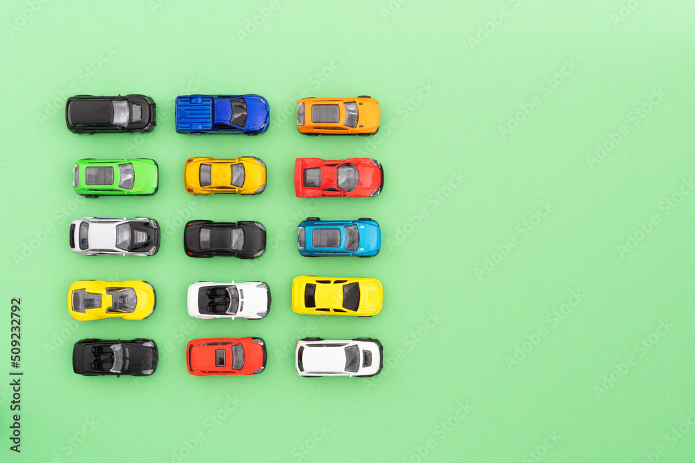 Set of colorful toy cars on green background. Set of colorful toy cars on green background.