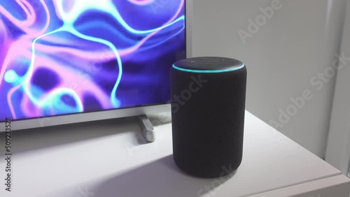 Activate speaker. Smart home vocal assistant in a modern house. photo