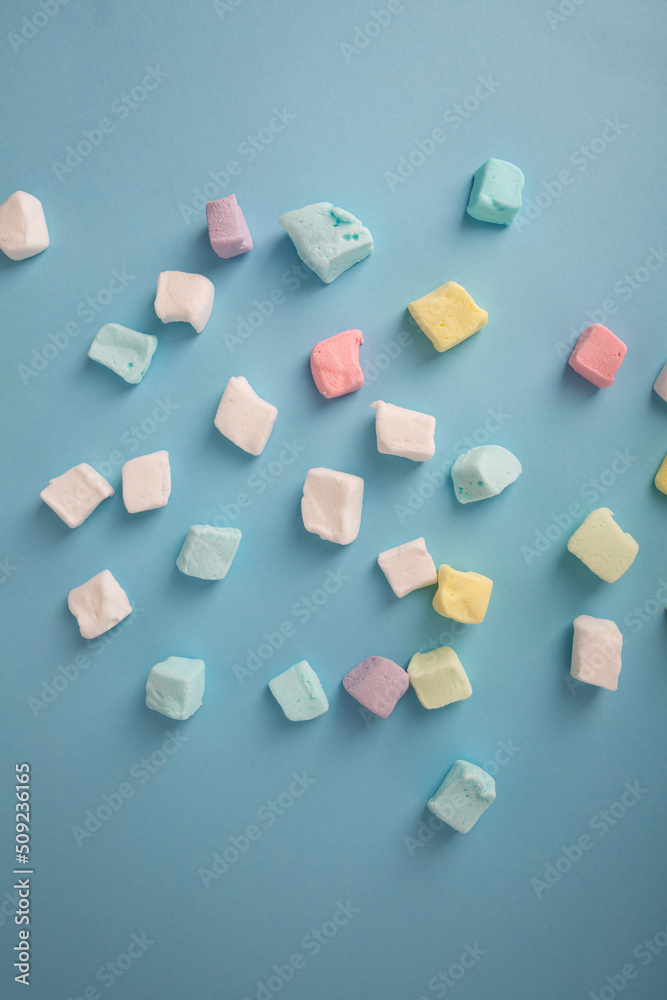 marshmallows gummy on blue surface sweet food marshmallows gummy on blue surface sweet food