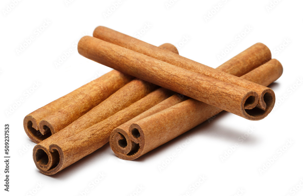 Cinnamon sticks heap, isolated on white background