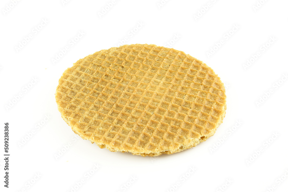 One whole caramel waffle. Stroopwafel isolated on white background One whole caramel waffle. Stroopwafel isolated on white background